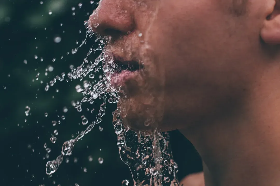 Person's face showing flushed, sweaty complexion after sauna on left side versus normal complexion on right, demonstrating bo